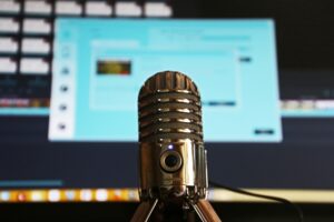 image of a Samson Meteor Microphone in front of a computer screen